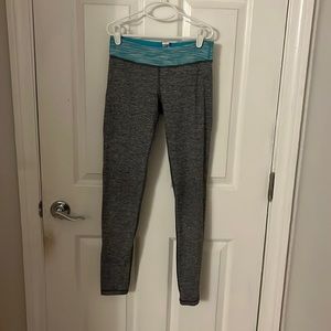 Ivivva low waisted leggings, gray & colorful stripped waist band, Childs size 10